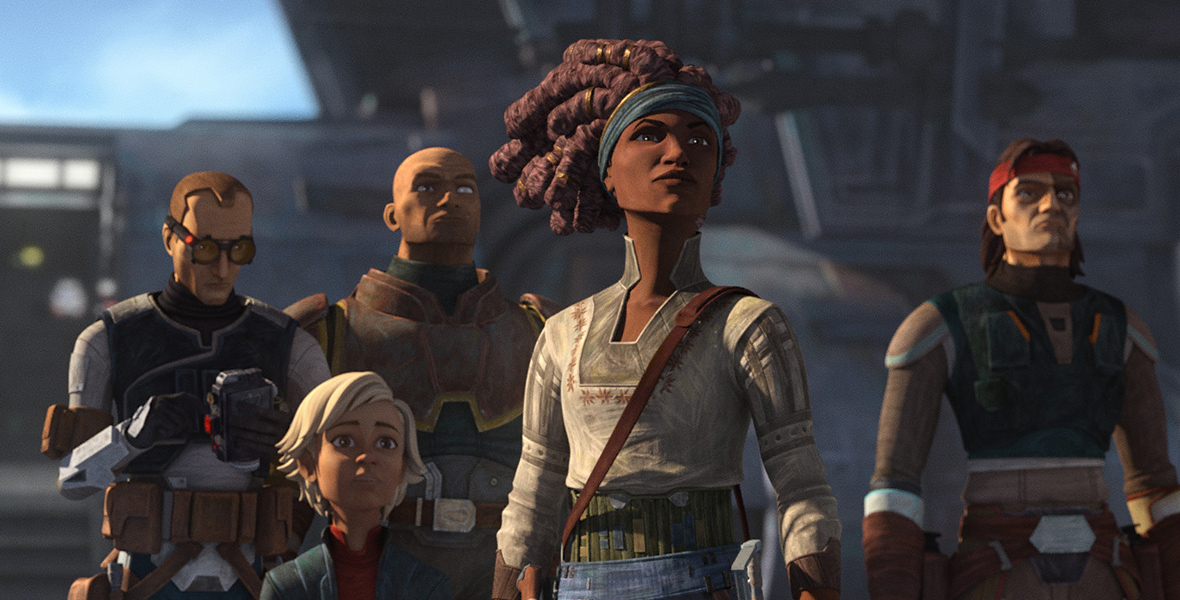 From left to right: Tech, Omega, Wrecker, Phee Genoa, and Hunter from Star Wars: The Bad Batch. All are looking toward something except Tech, who is focused on a gadget while wearing glasses with orange lenses. They are all wearing gray armor with red detailing. Additionally, Phee Genoa and Hunter wear a green and red bandana, respectively.