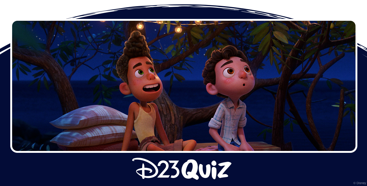 In a scene from the movie Luca, Italian boys Alberto (left) and Luca (right) are sitting on wooden planks built in a tree. Both gaze up at the stars, their expressions filled with wonder. Alberto sports a yellow tunic top paired with brown cargo pants, while Luca wears a white checkered flannel top with blue streaks and blue Bermuda shorts. String lights gracefully drape across branches, casting a soft glow. The backdrop showcases a starry night sky overlooking the sea.